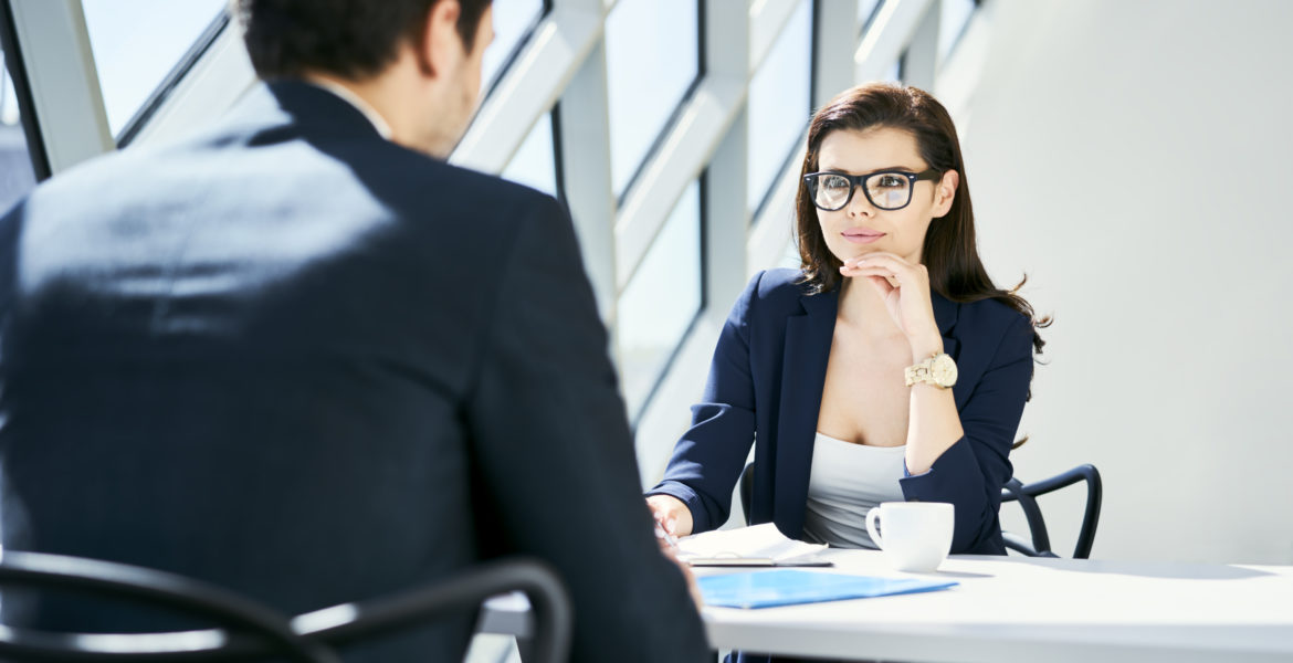 Businesswoman talking to another person