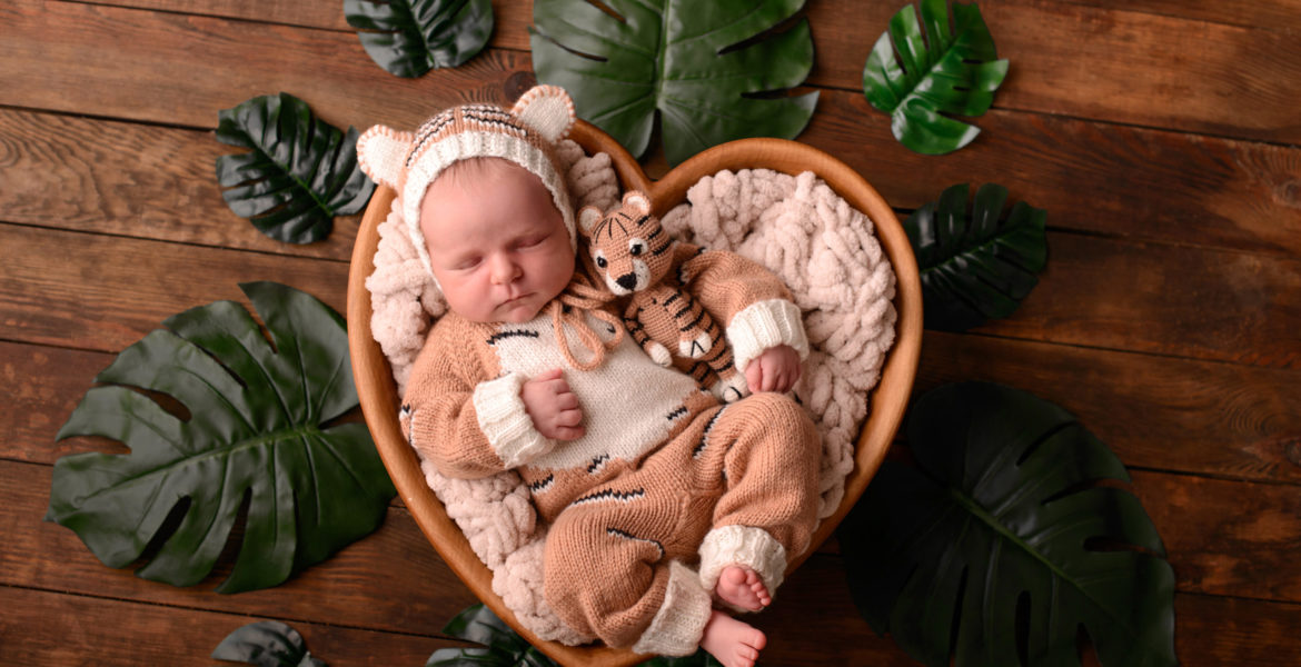 Portrait of cute adorable smiling white Caucasian baby girl boy