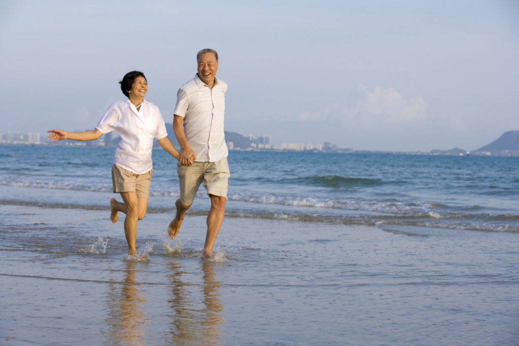 Portrait of senior couple on the beach